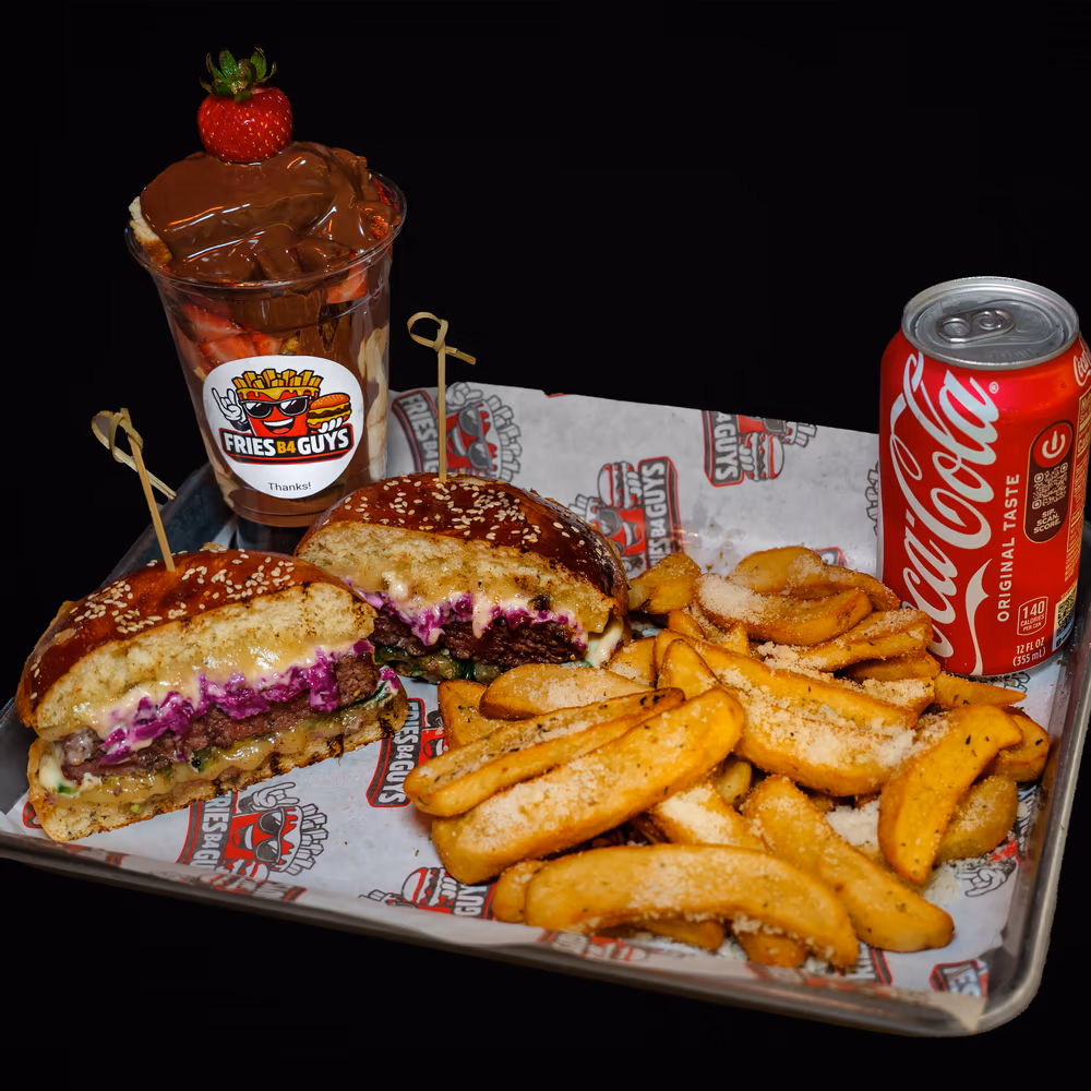 The Midnight Fire platter with Dutch-style fries, a branded dessert cup and a Coca-Cola on a metal tray